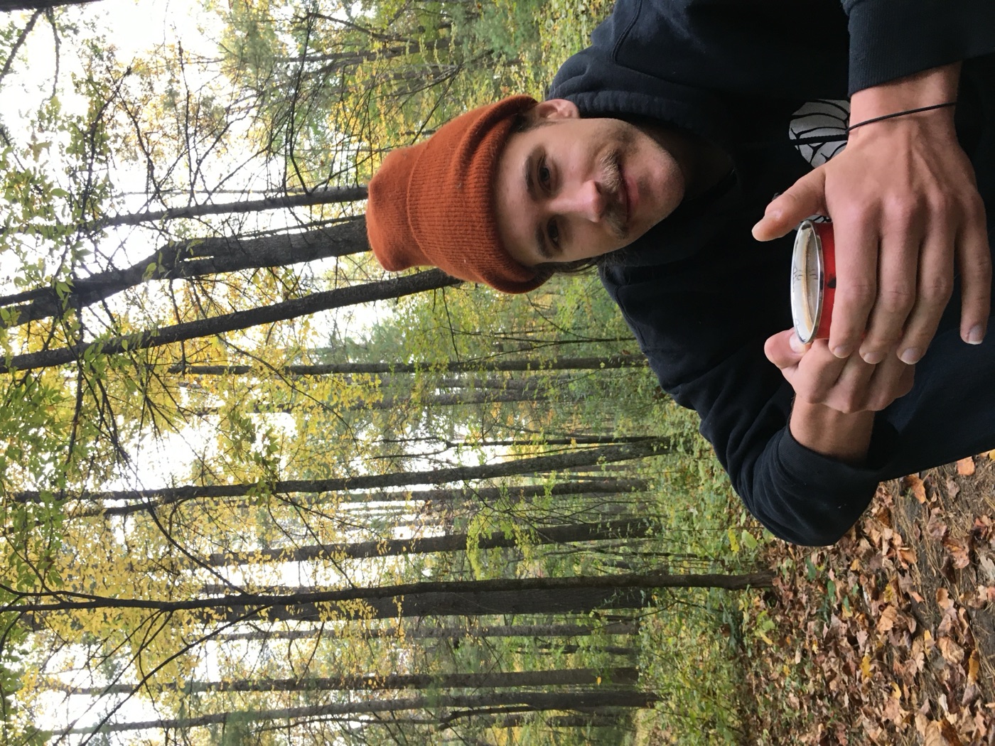 Andrew, outdoors, in a hat